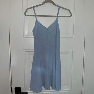 Blue bodycon but flowy mini dress.